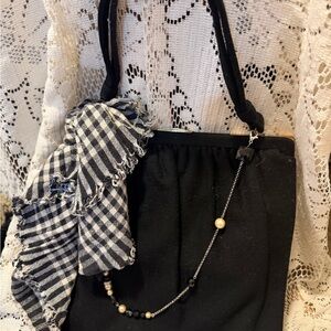 Elegant Black Handbag with Gingham Bow